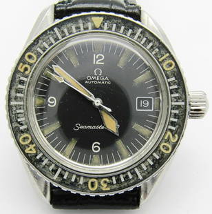 Omega Seamaster 300 Dive Watch: Ref 166024 Cal 565, 24 Jewel Movement. Original Dial and Hands. Faded Bezel. 40mm Case Diameter with Good Signed Screw Down Crown. Case Back with Seamaster Logo. New Strap.