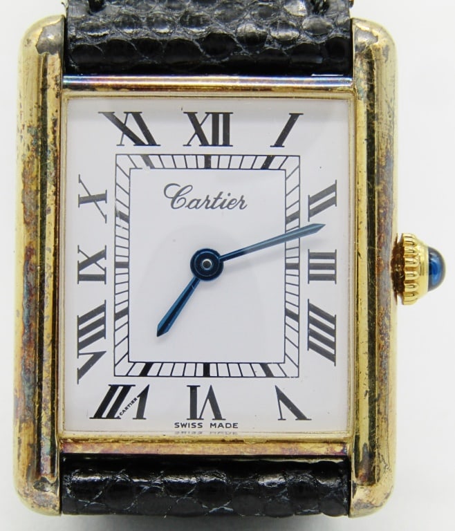 Tank - Cartier - Gents: 23x30mm Vermeil Case. Signed 17 Jewel Mechanical Movement. Signed Strap with Cartier Style Buckle.