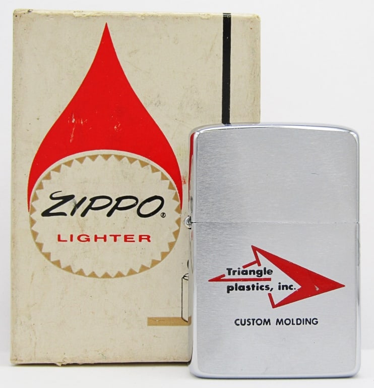 1964 Unfired Advertising Zippo In Original Box: "Triangle Plastics, inc. Custom Molding"; Unfired Zippo Lighter In Original Box.