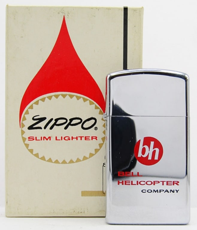 1974 Unfired Slim Advertising Zippo In Orig. Box: "Bell Helicopter Company" on Front; "OH - 58A" on Back; New & Unfired Zippo Lighter in Original Box.
