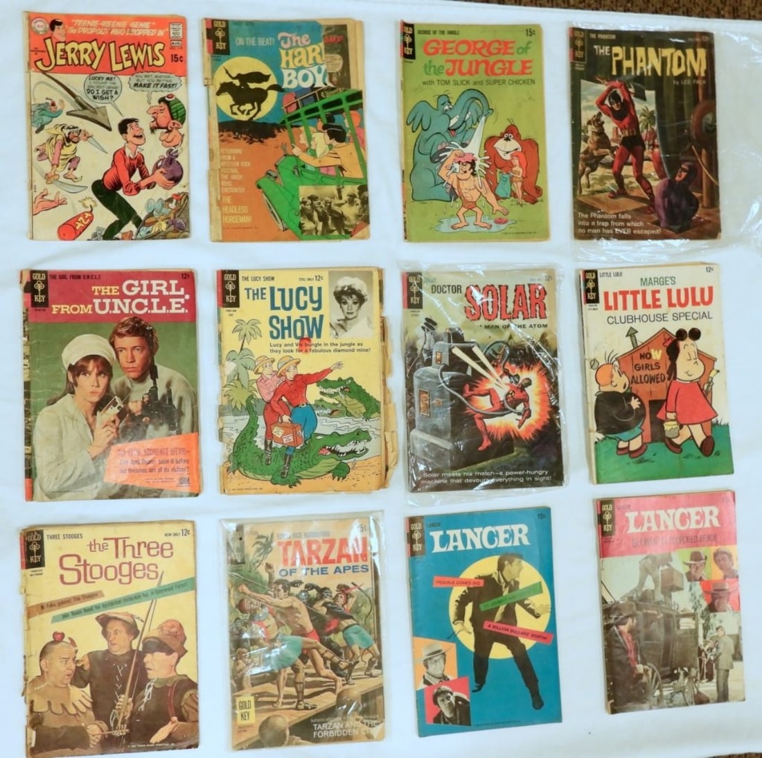 LOT OF 12 VINTAGE 12 & 15 CENT COMICS (1 of 2)