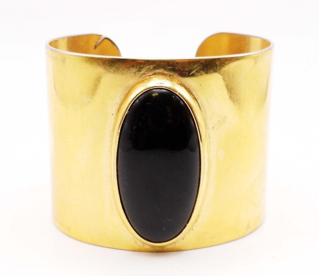 MONET LARGE CUFF BRACELET: 6IN WITH GAP, GOLD TONE, WITH A BLACK ONYX STONE IN THE MIDDLE, STAMPED MONET