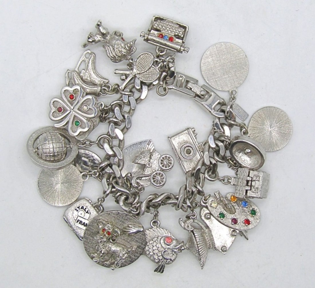 MONET SILVER TONE CHARM BRACELET (1 of 3)