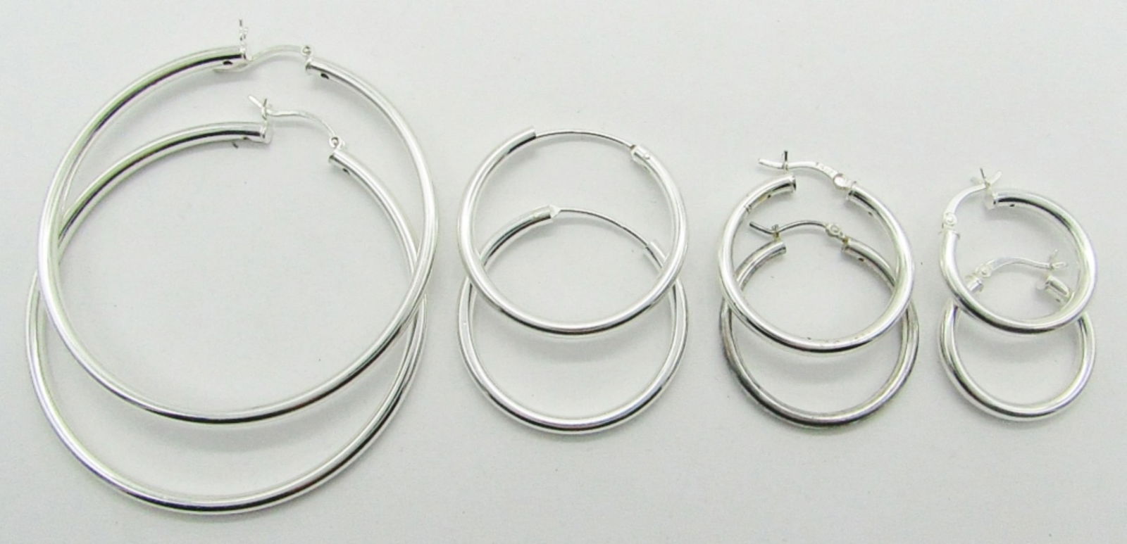 (4) STERLING HOOP EARRINGS (1 of 2)
