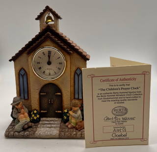 "The Children's Prayer Clock" Hummel: Goebel Hummel Figurine.6.5" tall. Little Boy on the left is loose and able to come off his spot, but not broken. Clock was not tested. Comes with COA