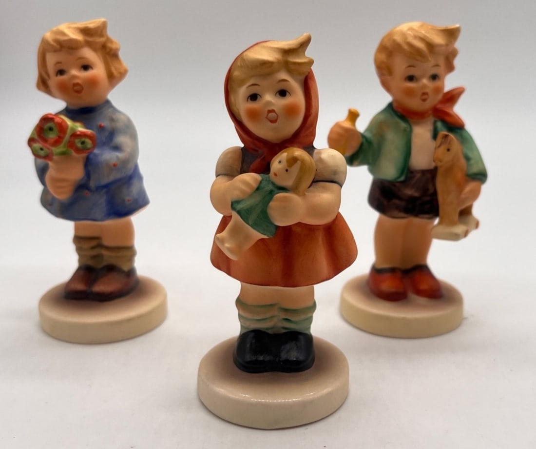 (3)Hummel Children Set #239 Figurines: Goebel Hummel "Girl with Nosegay" #239A 1967 Goebel Hummel "Girl with Doll" #239B 1967 Goebel Hummel "Boy with Toy Horse" 239C 1967. All Figurines 3.5"