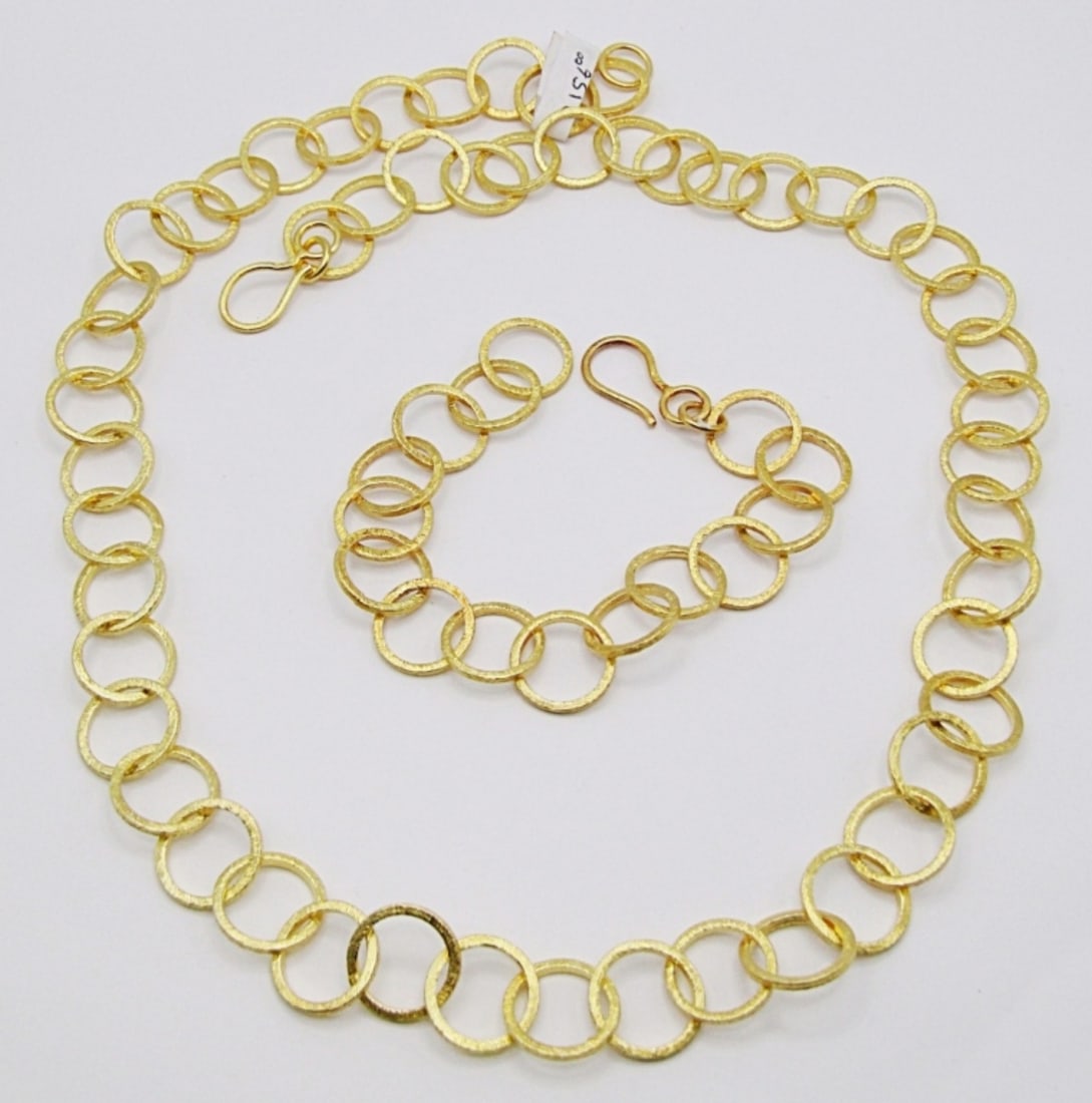 GOLD PLATED STERLING NECKLACE AND BRACELET SET: 31DWT, 23IN LONG NECKLACE WITH HOOK CLASP, 8 IN LONG BRACELET WITH HOOK CLASP, STAMPED 925 ON THE CLASPS
