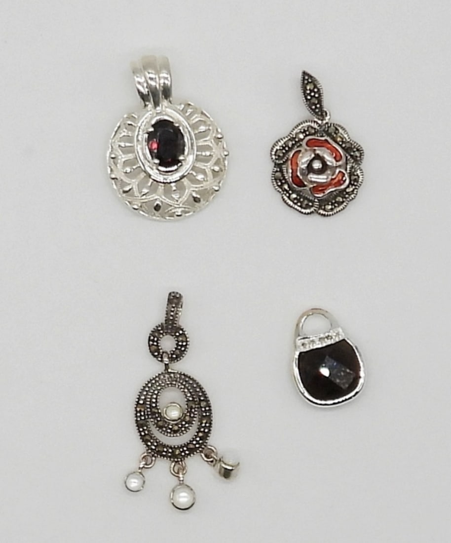 (4) STERLING PENDANTS - MARCASITE - ONYX: (4) ORNATE STERLING / MARCASITE / ONYX PENDANTS - ALL MARKED 925 - 10 DWT