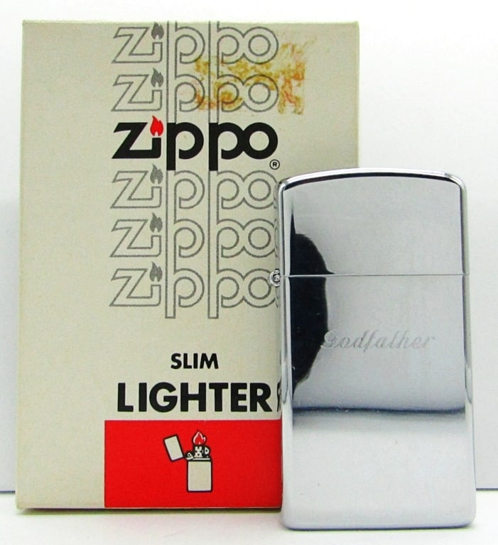 1981 Unfired Zippo Lighter No. 1610 High Polish: "Godfather" Etched on Front; Unfired in Original Box.