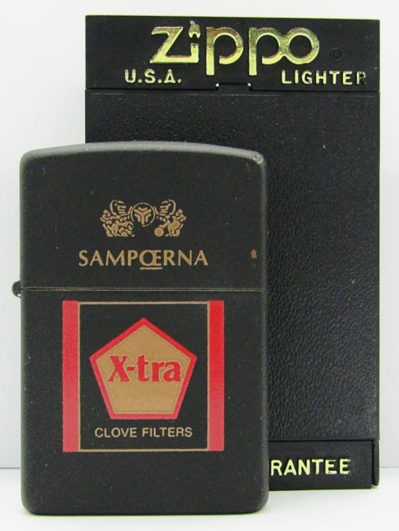 1996 Matte Black Advertising Zippo Lighter: Clove Cigarette Sampoerna X-tra; Used Condition.