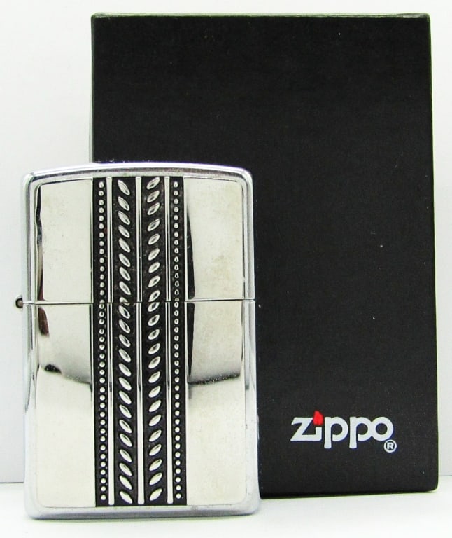 2002 Braided Silver High Polish Chrome Zippo: Lightly Fired Zippo Lighter In Original Box.