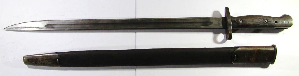 WWI Australian Lithgow MA1907 Bayonet: With Scabbard; 21.75" Overall Length, 16.75" Blade Length; Handle Marked "Australia". Used Condition.