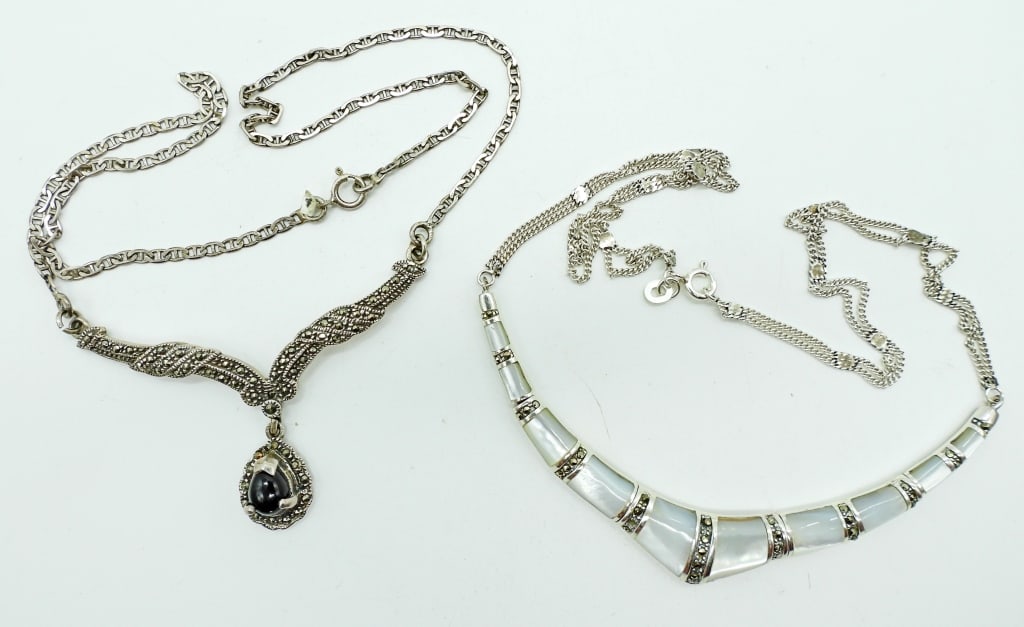 (2) MARCASITE STERLING FESTOON NECKLACES: 15.4DWT, 16IN LONG WITH SPRING CLASP, BOTH STAMPED 925, MOTHER OF PEARL INLAY AND BLACK ONYX STONE