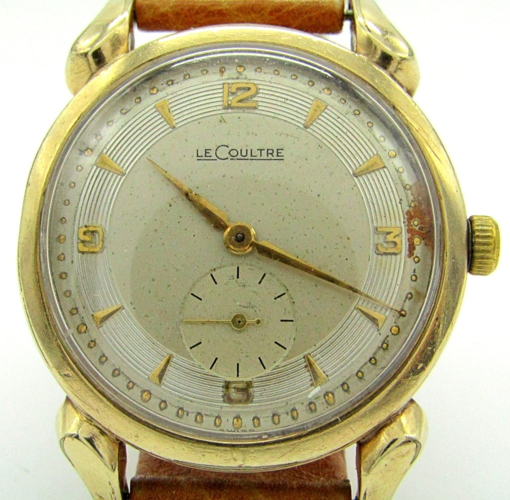 Vintage Gold Filled LeCoultre: Nice Original Tutone Dial, Yellow Gold Filled Screwback Case, Triple Signed, 34mm, 17 Jewel Cal 480/cw Movement, Chunky Case with Minimal Wear Through to the Lug Edges, New Strap. Nice Lugs!