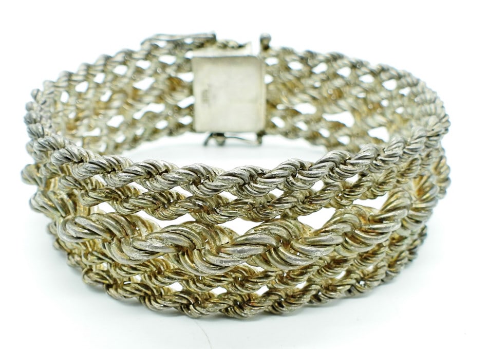 STERLING BRACELET: 46.3DWT, 8 1/2IN LONG, TWIST LAYERED CHAINS, OPEN BOX CLASP STAMPED 925 ON THE BACK