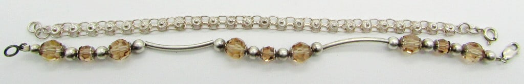 (2) Sterling Silver Fashion Bracelets: 10 dwt. Filigree Flower, Marked "CW 925" 7".; Tan Swarovski Alex & Ani 7.5"