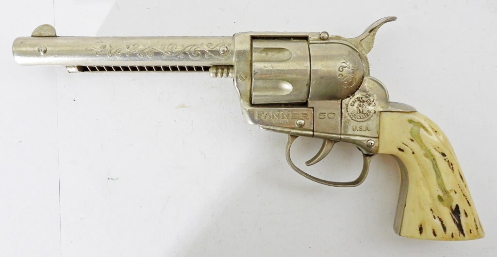 VINTAGE MATTEL FANNER 50 CAP TOY GUN: 10IN LONG, STAMPED MATTEL IN TOYMAKERS MARK, TIGGER CLICKS