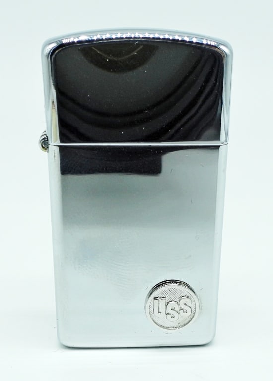 1981 ZIPPO USS UNFIRED SLIM LIGHTER: USS ON THE CORNER OF THE LIGHTER IN THE BOX, UNFIRED