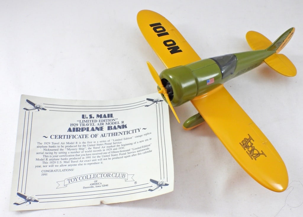 U.S. AIR MAIL COLLECTORS SERIES AIRPLANE BANK: 1991, GREAT CONDITION, U.S. MAIL "LIMITED EDITION" 1929 TRAVEL AIRE MODEL R AIRPLANE BANK, COA COMES WITH FROM TOY COLLECTOR CLUB, COINS GO IN SEATING AREA, PROPELLER OPENS TO LET COINS OUT