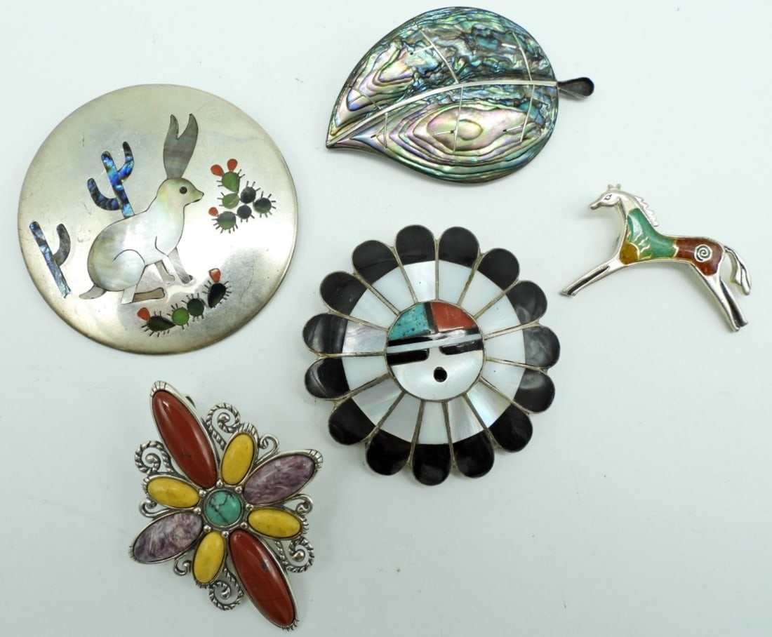 (5) STERLING BROOCHES with ZUNI: 50DWT, BETWEEN 1 1/2"- 2 1/2", 4 OUT OF 5 STAMPED 925, AND SOME STAMPED MEXICO, ALL DIFFERENT STYLES AND SHAPES