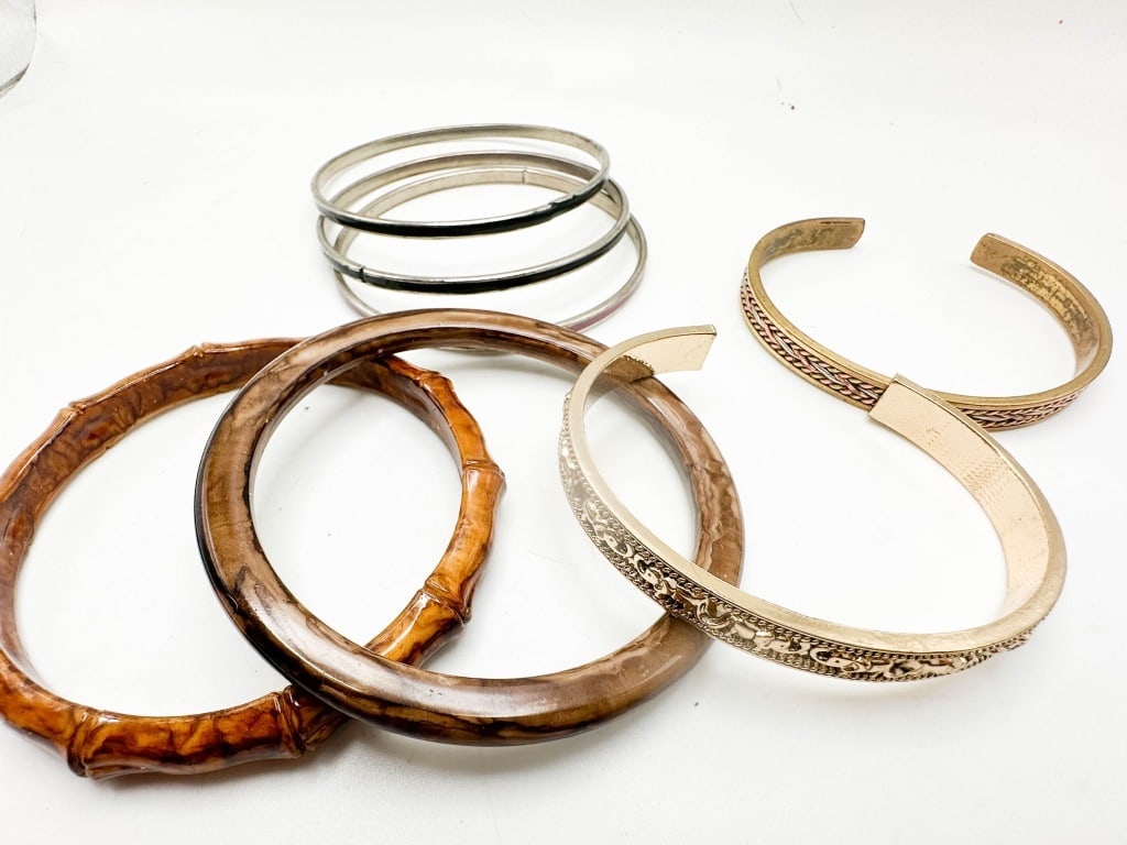 BRACELETS ASSORTED: BRACELETS ASSORTMENT, BETWEEN 2 1/2" FOR CUFFS AND 3"WIDE FOR BANGLES
