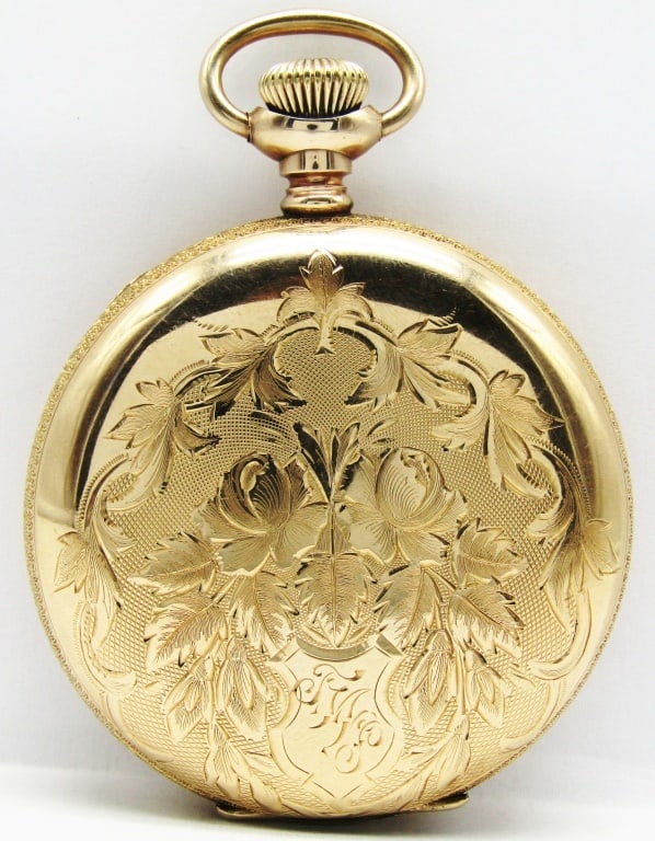 Illinois Sangamo - 16S, 23 Jewel Hunter: Double Sunk Porcelain Dial Signed "M.Judd Co., Toledo Ohio", 23 Ruby Jewel, Lever Set Hunting Case Movement with Pink Ribbon Demasking. Very Nice Yellow Gold Filled Keystone Case with Hinged Lids and 