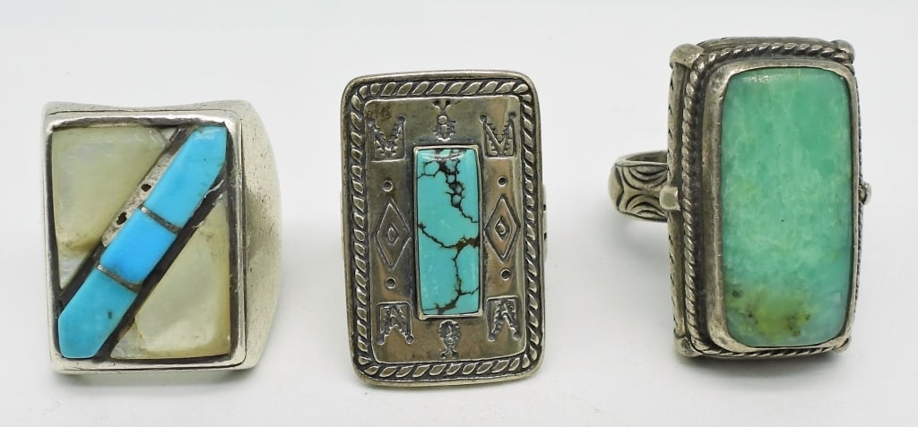 (3) Sterling Navajo Turquoise Rings: Southwestern Sterling with Turquoise & Mother of Pearl Inlay, Green Navajo Turquoise Rectangular Ring Marked "925", Sterling Native American Carolyn Pollack signed Turquoise Ring; 51 dwt. Sizes 10.5, 
