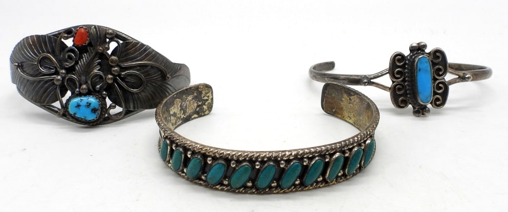 (3) TURQUOISE STERLING CUFF BRACELETS: 37.7DWT, ALL 2 1/2" WIDE,1- WITH TURQUOISE AND CORAL STAMPED ON THE BACK BY: RITA MONTOYA STERLING, 1- TURQUOISE IN THE MIDDLE STAMPED TC-217 MEXICO 925 RCS