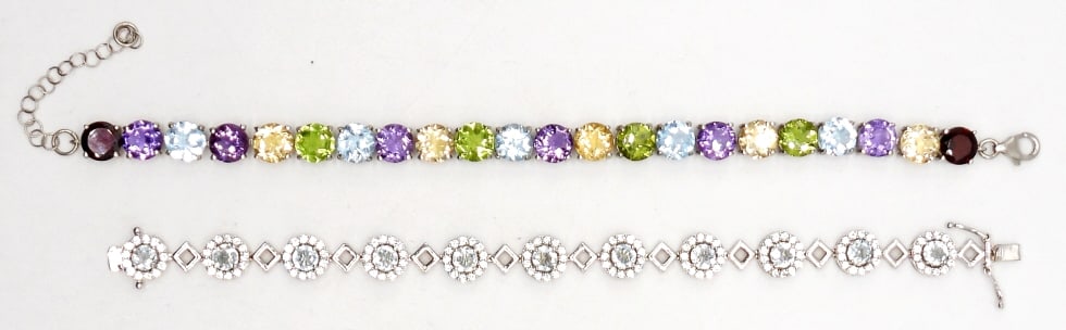 (2) STERLING & GEMSTONE TENNIS BRACELETS: STERLING SILVER TENNIS BRACELETS WITH MULTI COLOR GEMSTONES; STAMPED 925; 7.5"-8" LENGTHS; 23 DWT