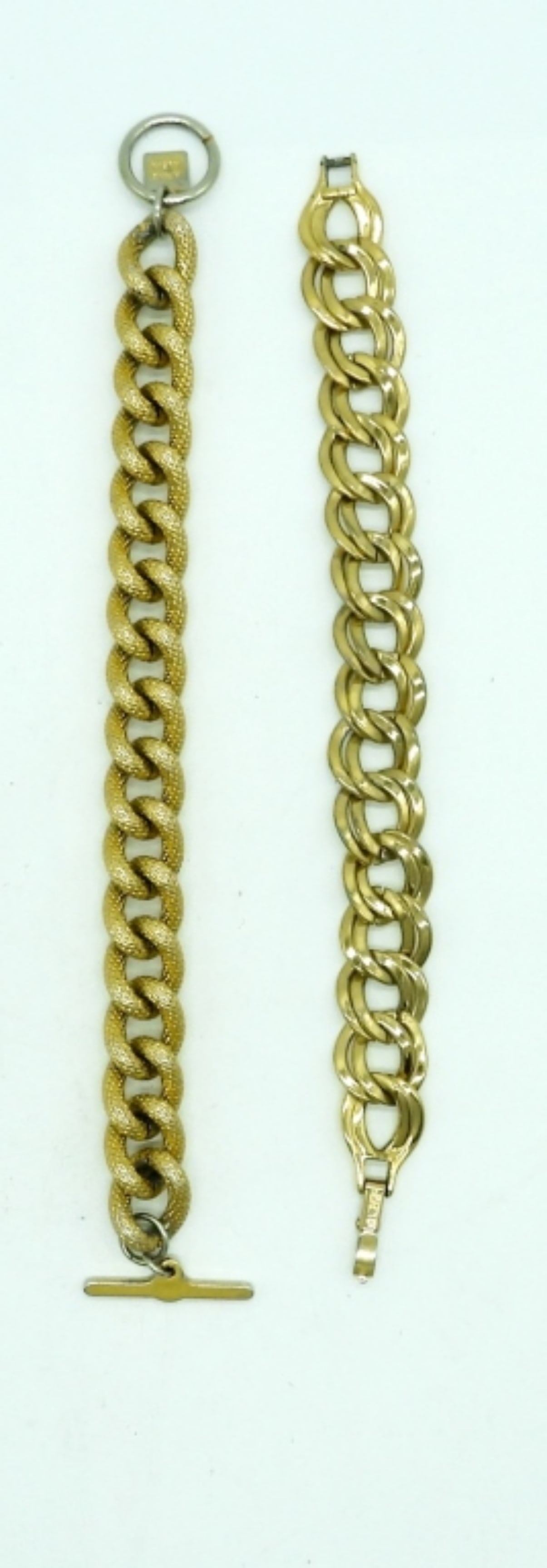 (1) MONET & (1) ANNE KLEIN BRACELETS: 8 INCH GOLD TONE LINK BRACELETS - STAMPED "MONET" / "ANNE KLEIN"