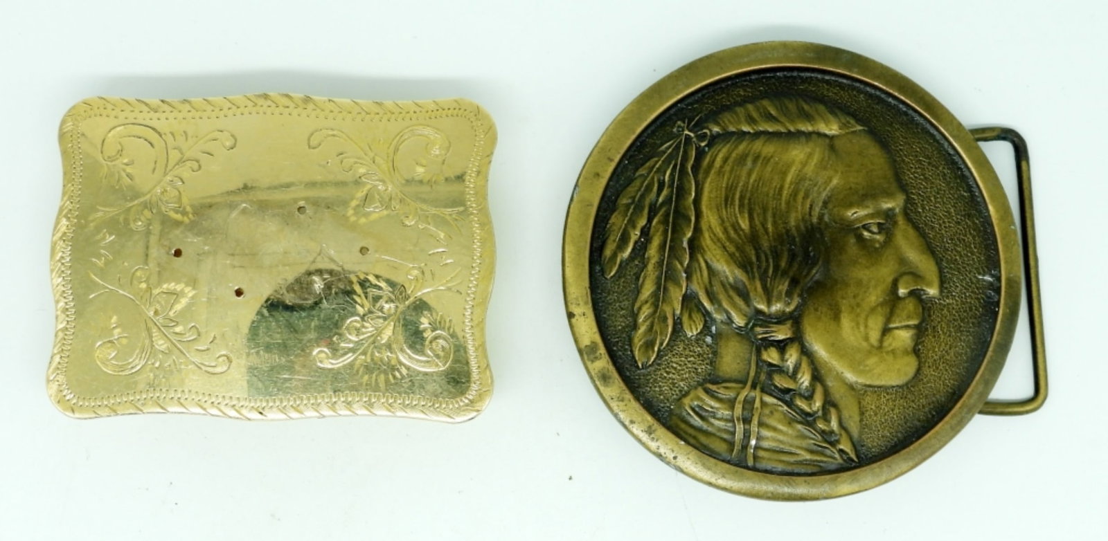 (2) VINTAGE GOLD TONE BELT BUCKLES: ORNATE ETCHED DESIGN, HEAVY INDIAN HEAD BUCKLE STAMPED "INDIANA METAL CRAFT"