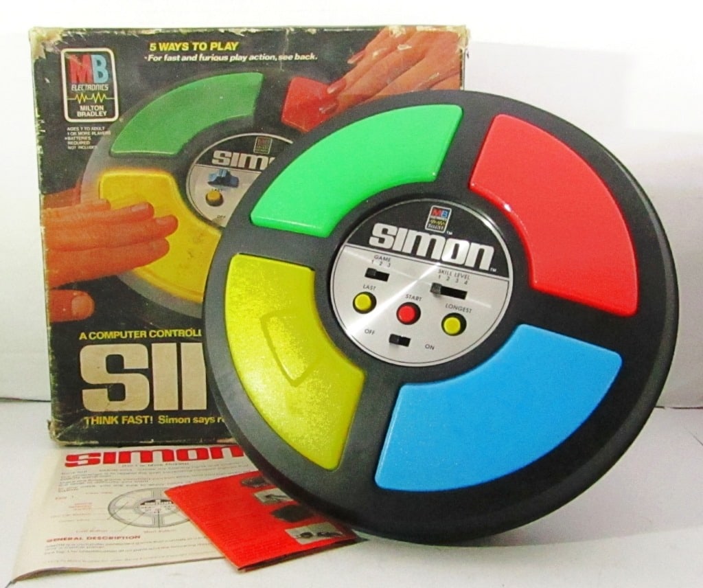 1978 Simon Says Electronic Milton Bradley Toy: In Original Box (Has wear and tear from age), Includes Instruction Booklet. Used Condition.