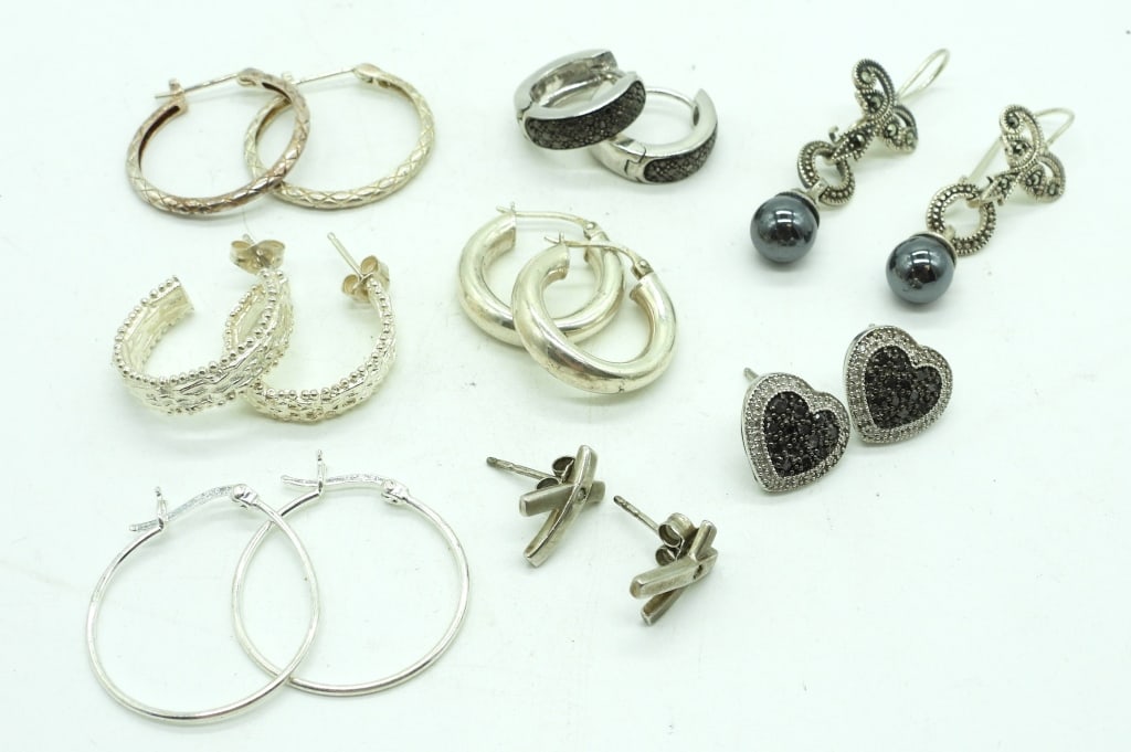 Assorted Sterling Earrings: Three marcasite pairs, one X ribbon pair, 4 half hoop pairs. (19.3 DWT)