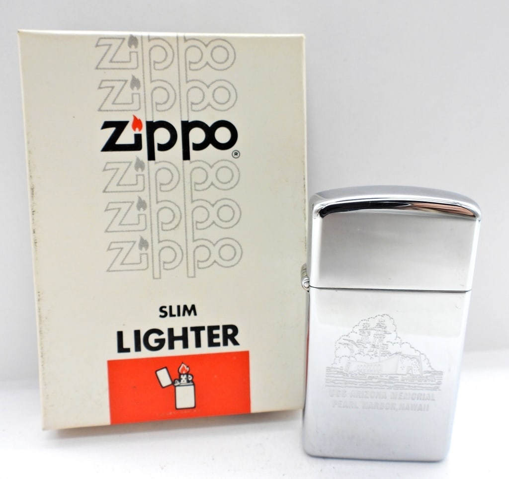 UNFIRED USS ARIZONA MEMORIAL SLIM ZIPPO LIGHTER: 1982, USS ARIZONA MEMORIAL PEARL HARBOR, HAWAII ETCHED ON THE FRONT, IN THE BOX