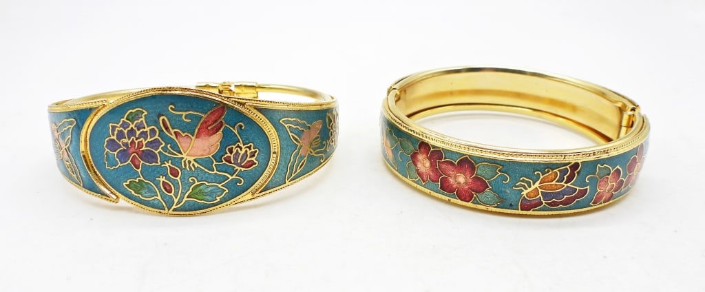 (2) CLOISONNE BANGLES: FLOWER AND BUTTERFLY DESIGN ALL AROUND GOLD TONE BANGLES. BOTH 2 1/2" WIDE