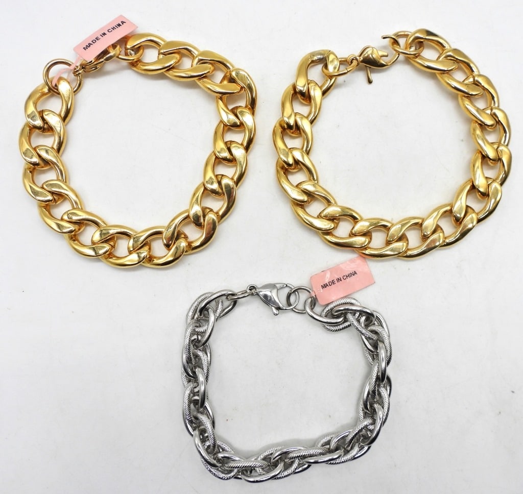 (3) FASHION BRACELETS: ALL 8 1/2" LONG, 2 GOLD TONE ( ONE CLASP NEEDS REPAIRED) 1- SILVER TONE
