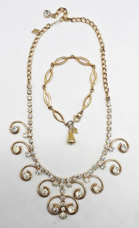 SARAH COV CLEAR RHINESTONE NECKLACE AND BRACELET: 17" LONG, GOLD TONE WITH CLEAR STONES, STAMPED SARAH COV NEAR HOOK CLASP, 7 1/2" LONG STAMPED NEAR LOBSTER CLASP