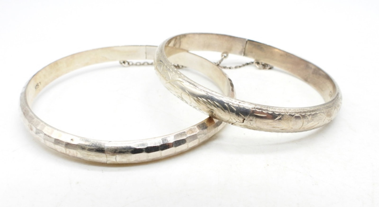 (2) STERLING OPEN BANGLES: 12DWT, 1- 3" WIDE HAMMERED STYLE DESIGN, 1- 2 1/2" WIDE ETCHED DESIGN, BOTH STAMPED 925