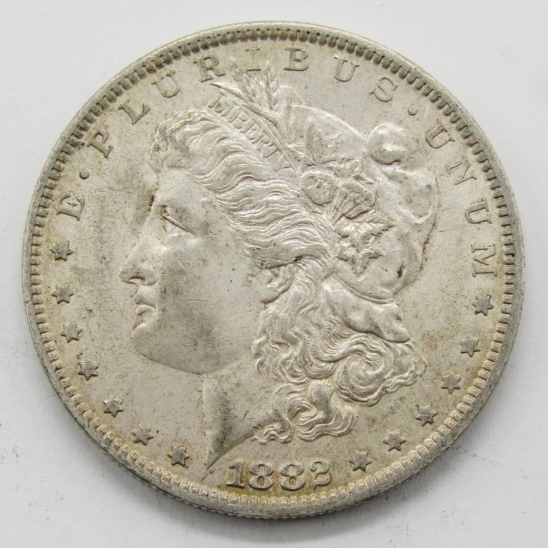 1882-O MORGAN DOLLAR AU: ONE STOP SHOP FOR ANTIQUES, COLLECTIBLES, AND COINS