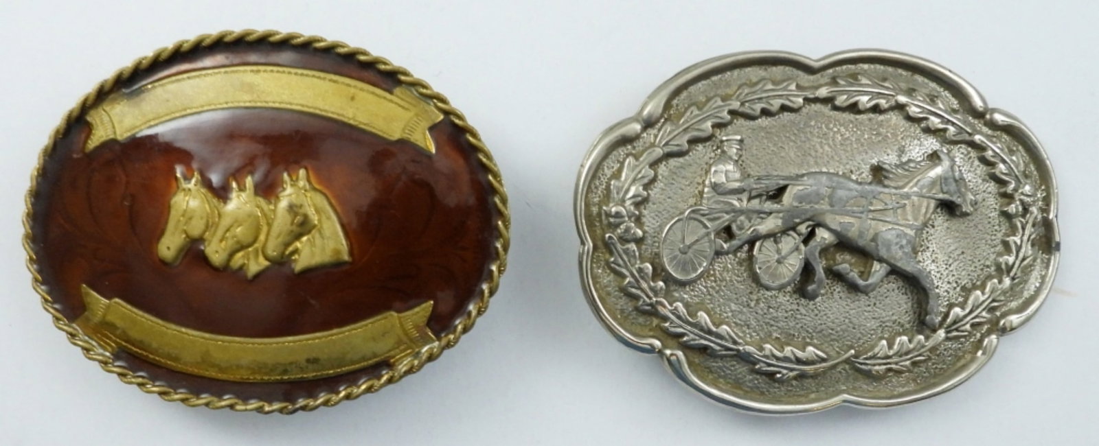 (2) SOUTHWEST STYLE BELT BUCKLES: WITH HORSE DESIGNS, (1) STAMPED GERMAN SILVER