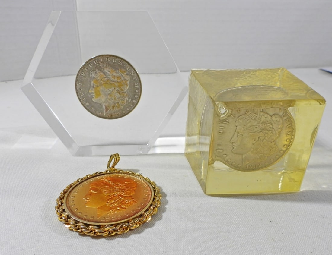 (3) MORGAN DOLLARS IN ACRYLIC/RESIN: (1 of 3)