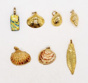 (7) GOLD TONE PENDANTS - SEASHELLS