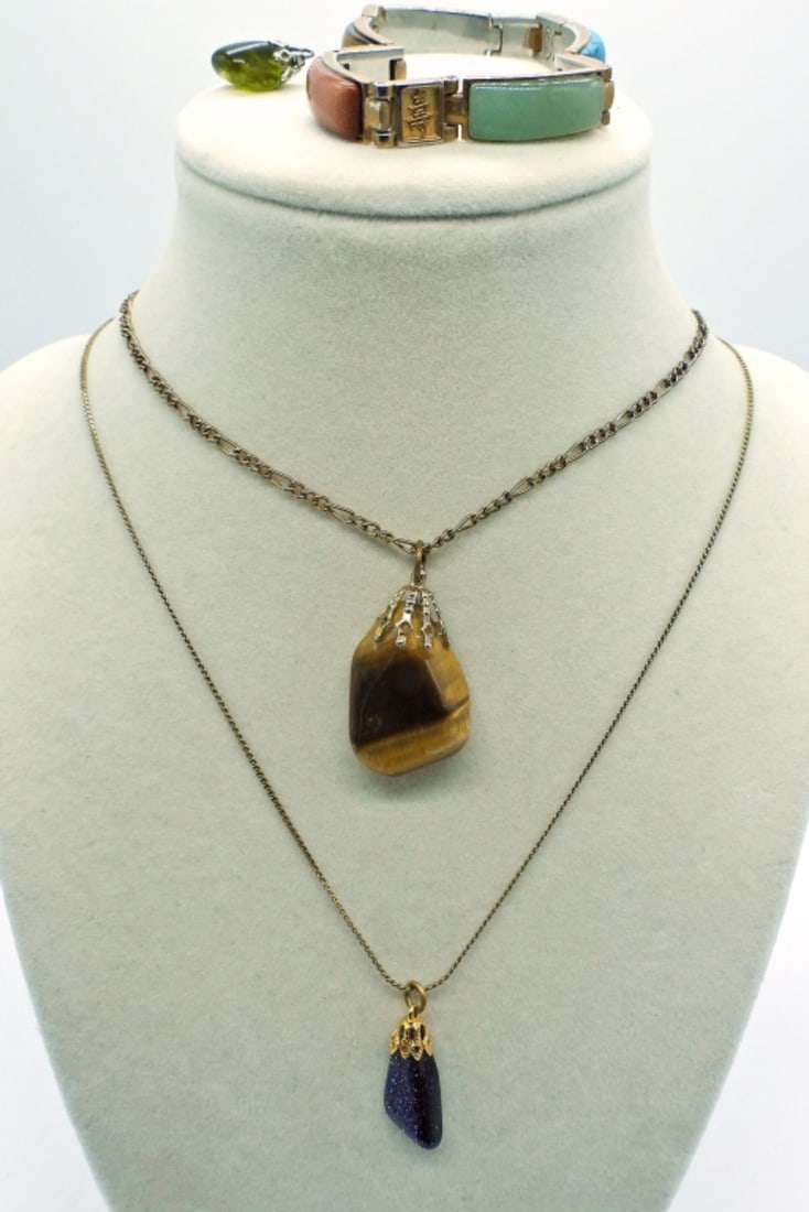 Blue Goldstone, Tigers Eye & Peridot Colored Gems: Blue Goldstone Gemstone with Gold Tone 16 inch Chain. Tigers Eye Gemstone with Gold Tone 16 inch Chain. Peridot Colored Gemstone Pendant, and Colorful Gemstone Bracelet.