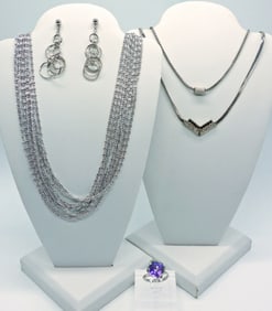 Three Silver Tone Necklaces with Earrings and Ring