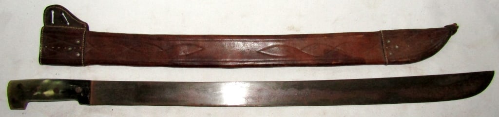 El Martillo No. 22 Machete & Leather Scabbard: Blade Marked "El Martillo No. 22"; 26" Blade, 31.25" Overall.