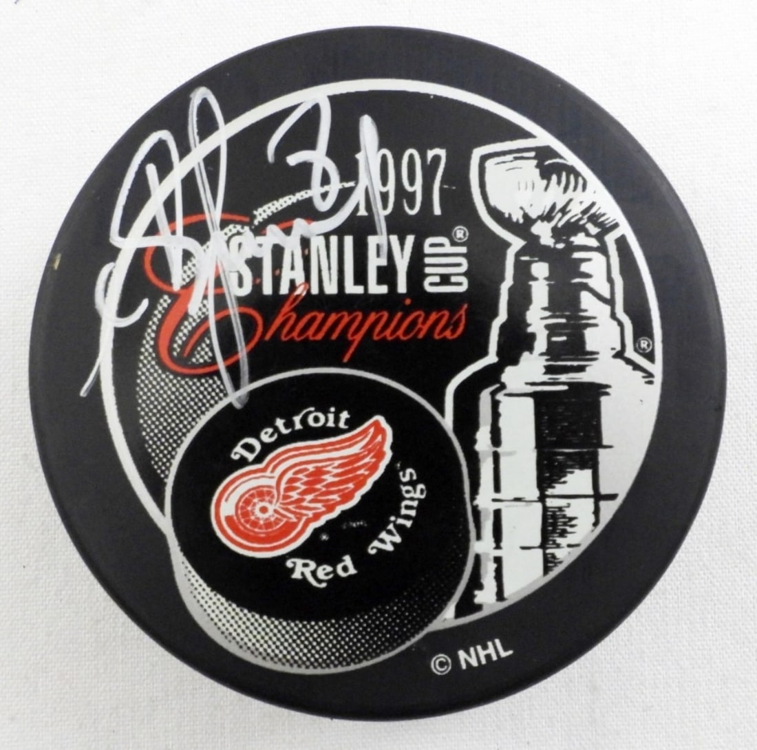 IGOR LARIONOV AUTOGRAPH 1997 STANLEY CUP PUCK (1 of 3)