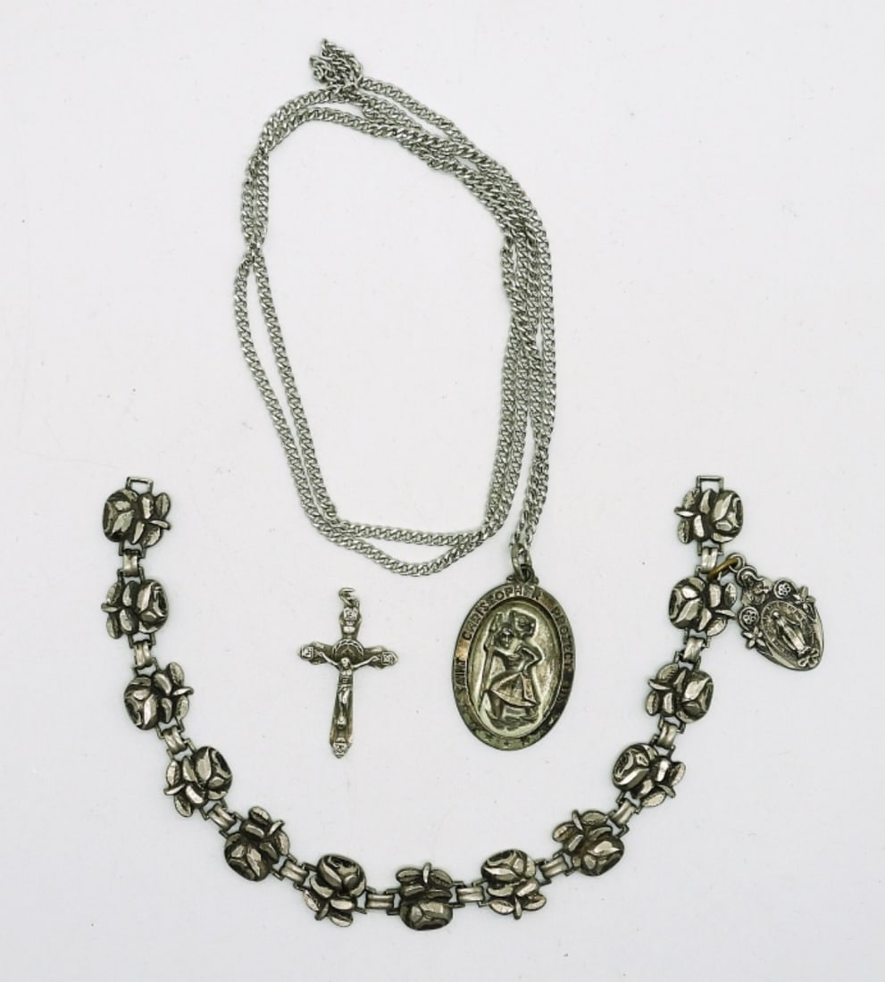 (3) Christian Religious Sterling Set: Sterling Saint Christopher Pendant on 24 inch chain. Carved Sterling Rose Bracelet with Jesus medallion. Sterling Crucifix Pendant. 19.6DWT