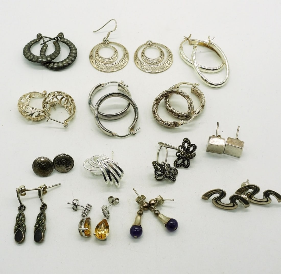 (14) Sterling Earrings. Huge Variety: All Earrings are Pierced and Sterling Silver. Lots of Variety. NOTE: One Pair Missing A Hook. 30DWT