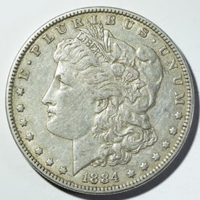 1884 MORGAN DOLLAR AU