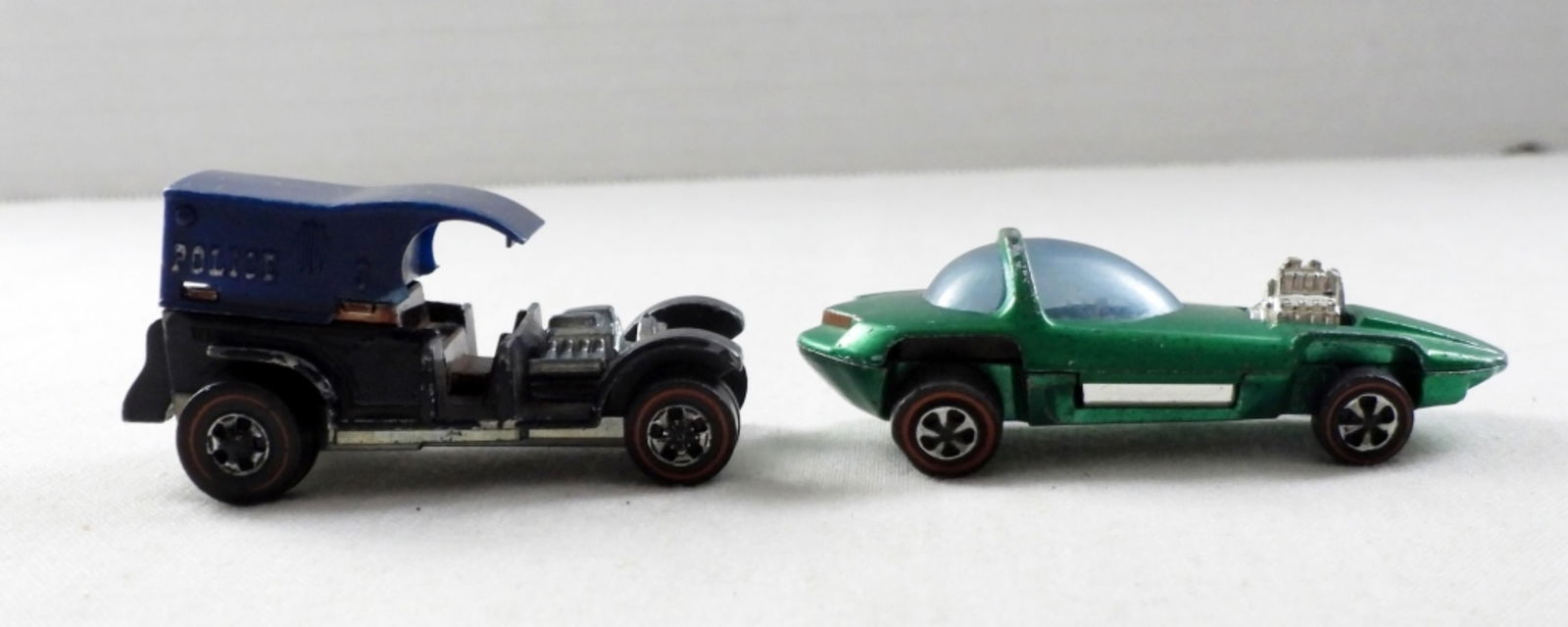 (2) VINTAGE 1960's REDLINE HOT WHEELS: 1967 HOT WHEELS REDLINE SILHOUETTE GREEN WITH GRAY INTERIOR & TINTED DOME; 1969 HOT WHEELS REDLINE PADDY WAGON POLICE CAR
